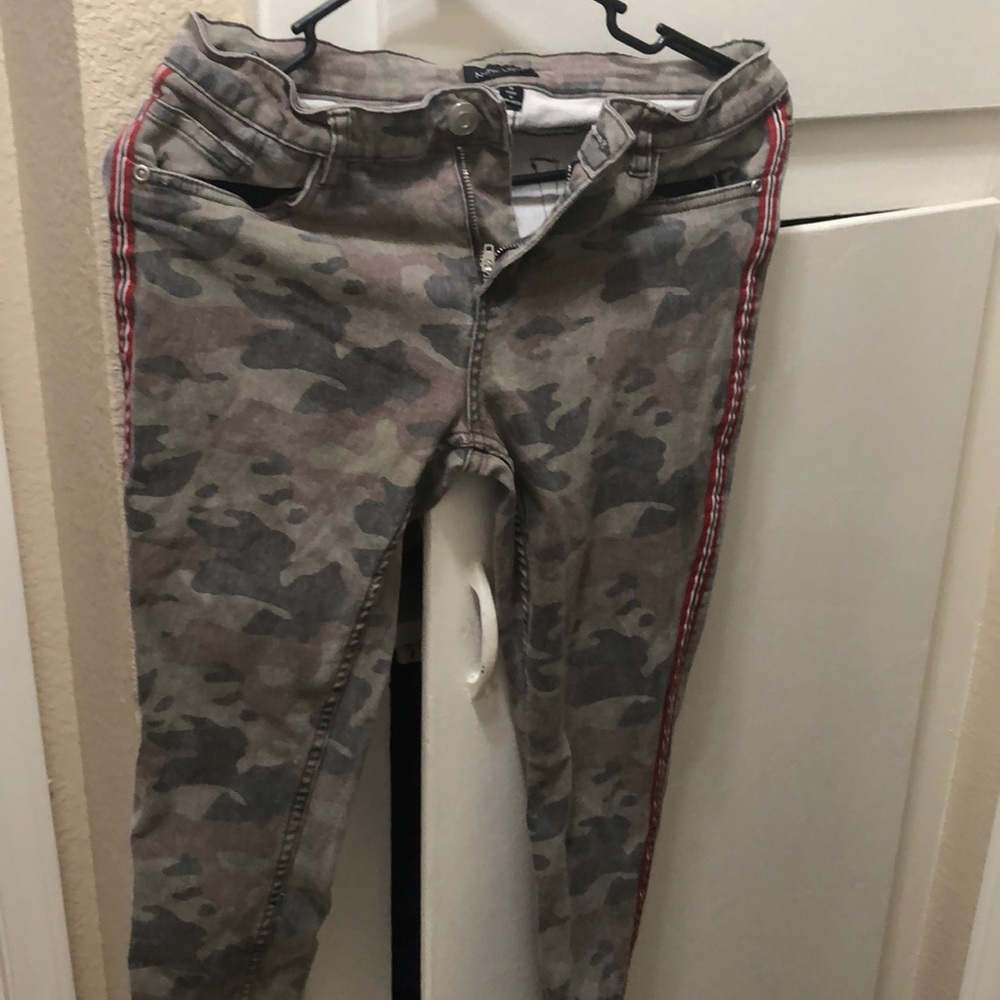 Skinny camouflage jeans with stripe on the side